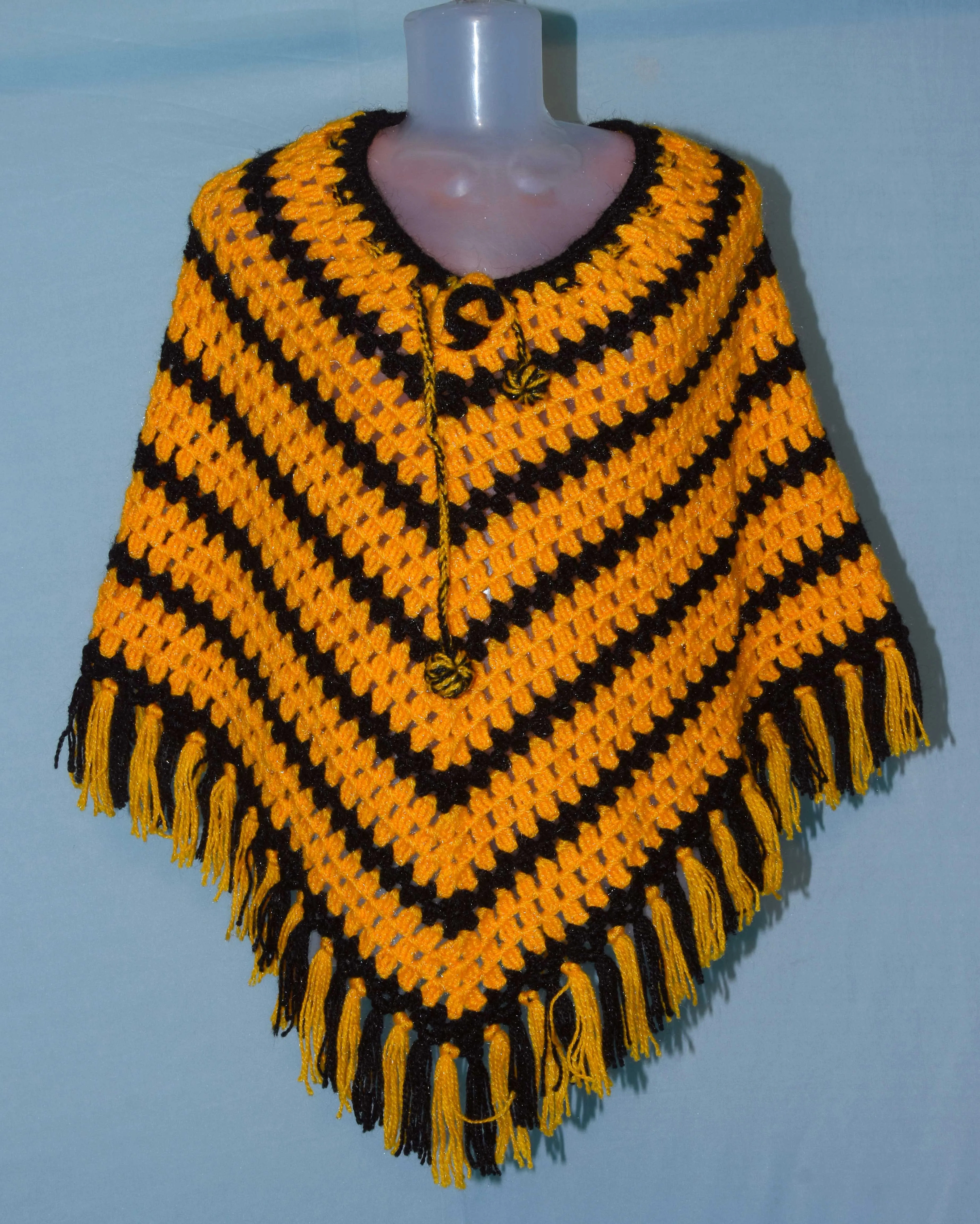 Orange and black color combi beautiful design poncho hand knitted woolen for women